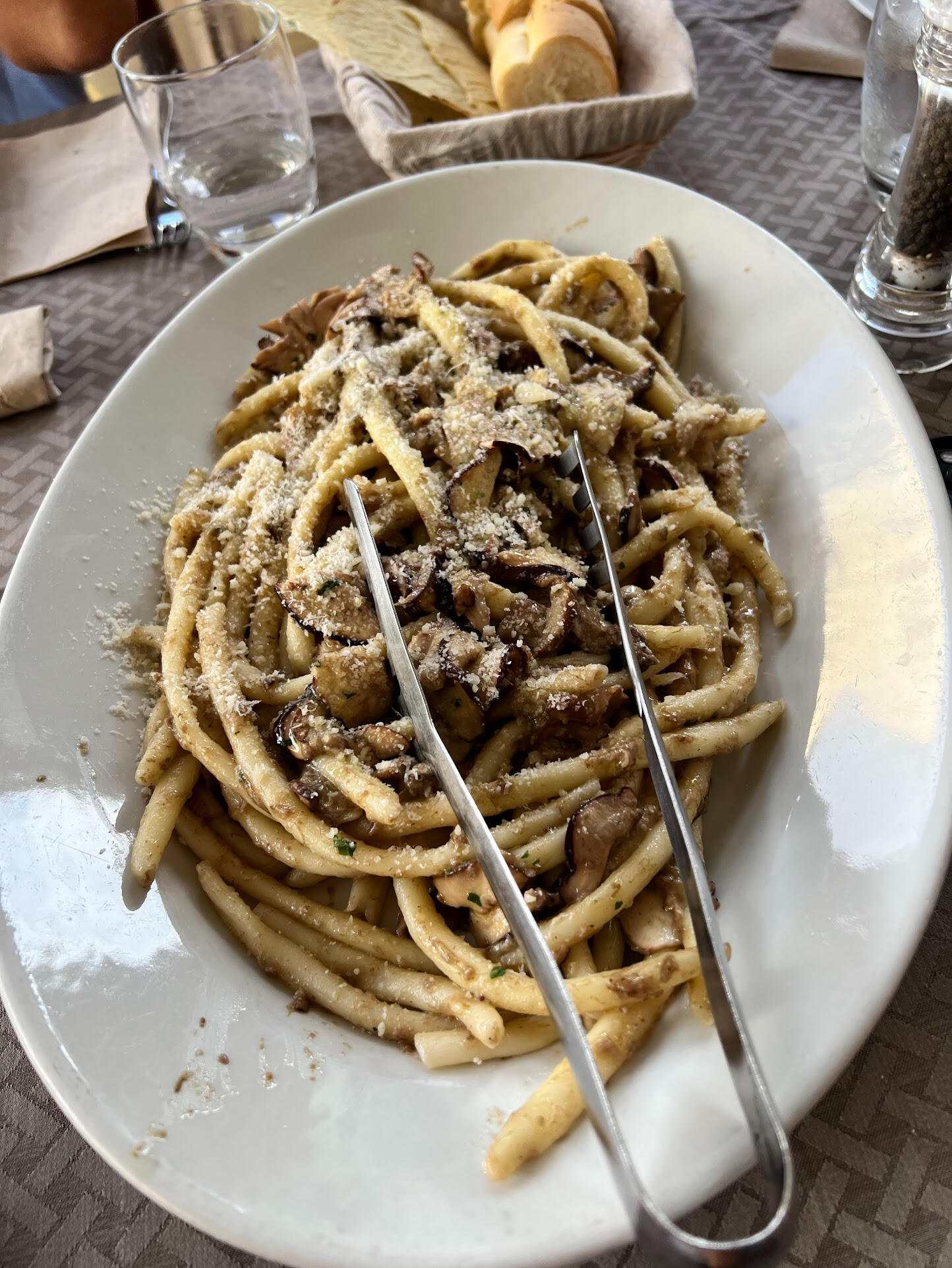 Homemade pasta with fresh local mushrooms, a km-zero dish prepared by Mama Teresa at Trattoria Locanda Stella in Monti, Sardinia.